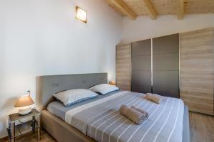 Postel nebo postele na pokoji v ubytování Apartments Relax