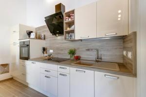 Kuchyň nebo kuchyňský kout v ubytování Apartments Relax