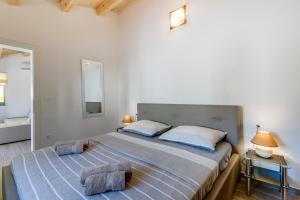 Postel nebo postele na pokoji v ubytování Apartments Relax