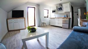Kuchyňa alebo kuchynka v ubytovaní Apartamenty Karkonoskie