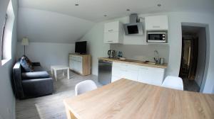 Kuchyňa alebo kuchynka v ubytovaní Apartamenty Karkonoskie