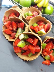 a group of fruit cups with fruit in them at Atrium Hotel Thassos in Potos