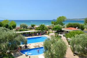 an image of a swimming pool at a resort at Atrium Hotel Thassos in Potos