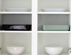 two white bowls on shelves in a kitchen at Ventoux in Aviemore