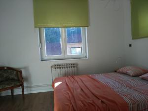 Postel nebo postele na pokoji v ubytování Two Flowers Apartments