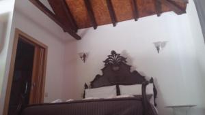 Cama o camas de una habitación en Villas da Quintã
