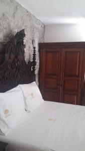 Cama o camas de una habitación en Villas da Quintã