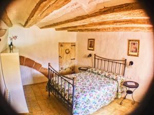 Cama o camas de una habitación en Casa Rural FuenteVieja
