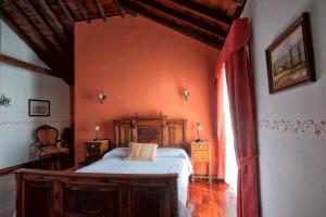 Postel nebo postele na pokoji v ubytování Hotel Rural Senderos de Abona