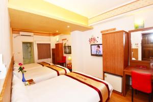 TV a/nebo společenská místnost v ubytování Nice Hotel