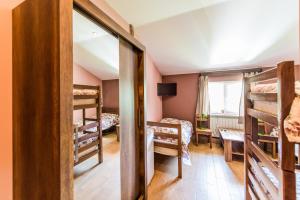Rúm í herbergi á Guest House 15