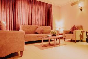 Χώρος καθιστικού στο La Rosa Hotel By Brother International