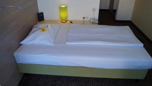 Letto o letti in una camera di Gästehaus Fernblick
