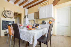 a kitchen with a table with food on it at B&B Antico Cortile in Milan