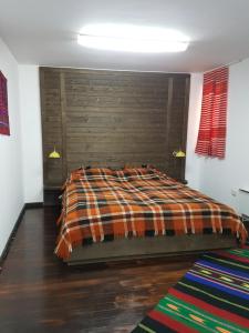 En eller flere senge i et værelse på Holiday Village Kochorite