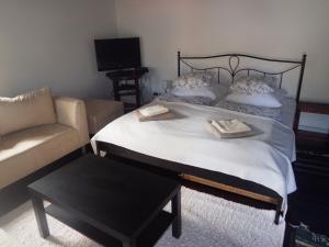 A bed or beds in a room at Country house Balaton