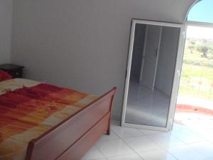 Postel nebo postele na pokoji v ubytování Résidence Jlidi