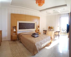 A bed or beds in a room at San Lorenzo - Boutique Hotel & SPA