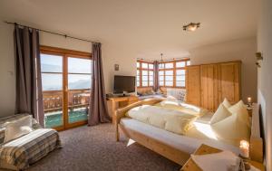 Ένα ή περισσότερα κρεβάτια σε δωμάτιο στο Berggasthof Hummelei