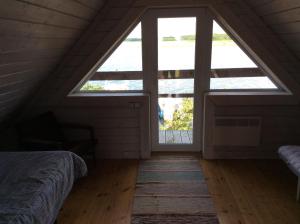 Postel nebo postele na pokoji v ubytování Seaside cottage