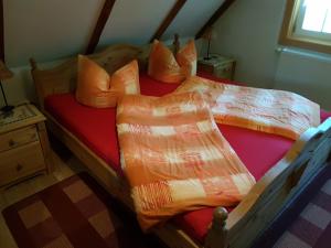 Postel nebo postele na pokoji v ubytování Ferienwohnung Zum Heuschober
