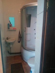 Koupelna v ubytování Hotel Uyut