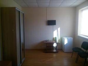 TV a/nebo společenská místnost v ubytování Hotel Uyut