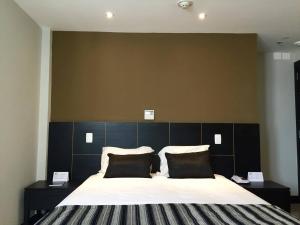 Hotel Atlântico Tower客房内的一张或多张床位