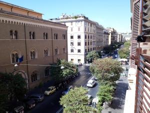 a view of a city street with buildings and cars at Residenza Cola Di Rienzo - Suite In Rome in Rome