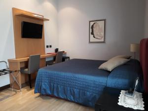 Ένα ή περισσότερα κρεβάτια σε δωμάτιο στο Residenza Cola Di Rienzo - Suite In Rome