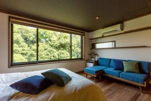 Postel nebo postele na pokoji v ubytování Ryokan Oomuraya + 37 fotografií