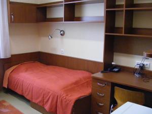 Postel nebo postele na pokoji v ubytování Study K & M Hotel