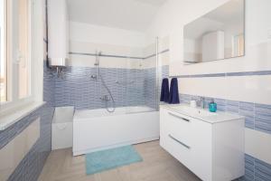 Koupelna v ubytování Apartments Tamburini