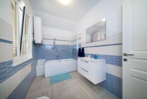 Koupelna v ubytování Apartments Tamburini