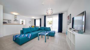 TV a/nebo společenská místnost v ubytování Apartments Tamburini