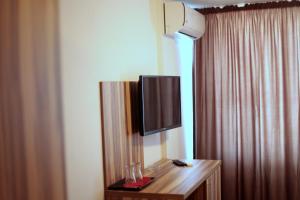 TV a/nebo společenská místnost v ubytování Hypnotique