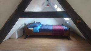 Postel nebo postele na pokoji v ubytování Homestay Stavenisse