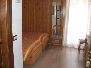 Postel nebo postele na pokoji v ubytování Hotel Edelweiss