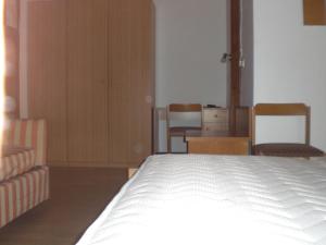 Postel nebo postele na pokoji v ubytování Hotel Edelweiss
