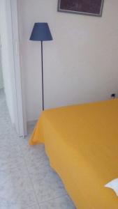 A bed or beds in a room at Le Querce Santa Cesarea Terme