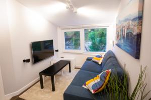 TV a/nebo společenská místnost v ubytování Apartman Anita