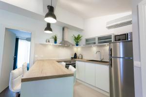 Kuchyňa alebo kuchynka v ubytovaní Apartman Anita