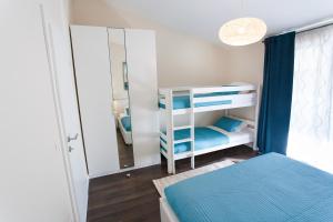 Posteľ alebo postele v izbe v ubytovaní Apartman Anita
