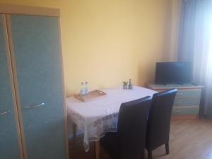 Telewizja i/lub zestaw kina domowego w obiekcie Restauracja - Hotel Nova