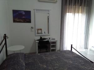 Postel nebo postele na pokoji v ubytování Caltagirone Casa Serena