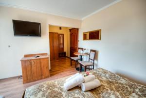 Μια τηλεόραση ή/και κέντρο ψυχαγωγίας στο Villa Meridian