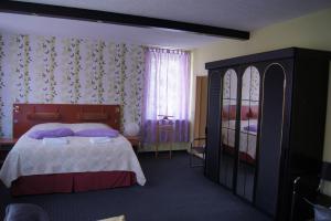 Postel nebo postele na pokoji v ubytování Hotel Draschwitz