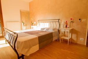 Postel nebo postele na pokoji v ubytování B&B GARDA IN