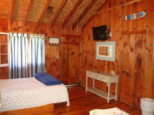 Postel nebo postele na pokoji v ubytování Paradise Resort Saratoga