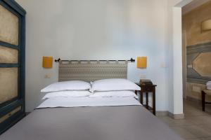 Cama o camas de una habitación en Residenza Baldesca